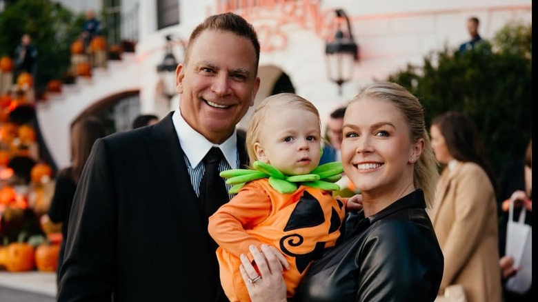 Karoline Leavitt and Nicholas Riccio holding their baby