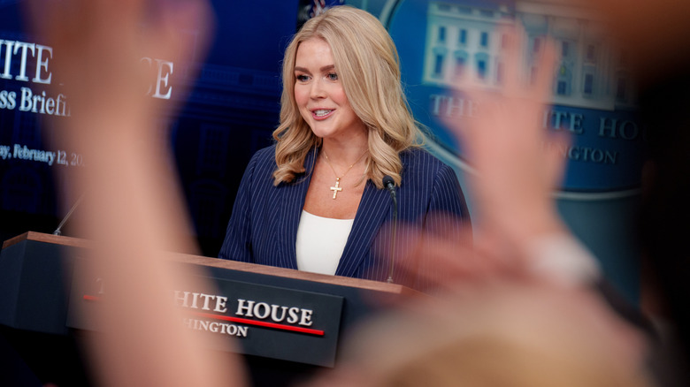 Karoline Leavitt on the podium at a White House press briefing.