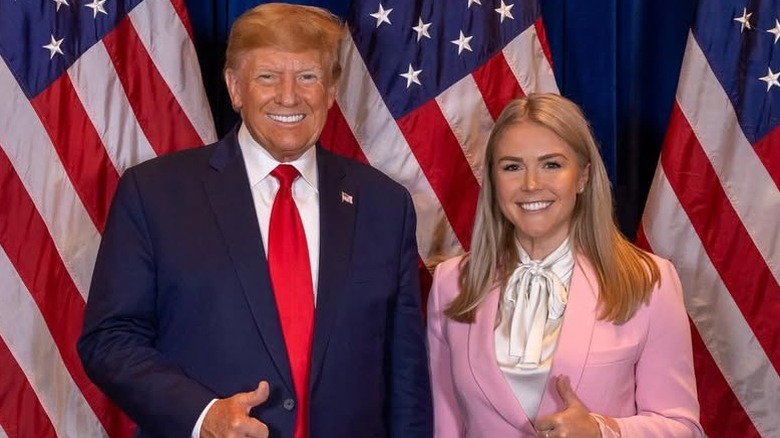 Donald Trump and Karoline Leavitt giving thumbs up