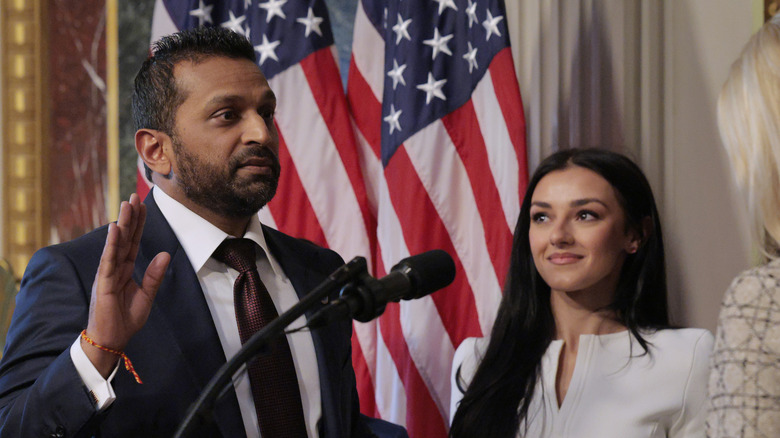 Alexis Wilkins stands next to Kash Patel on his swearing in ceremony