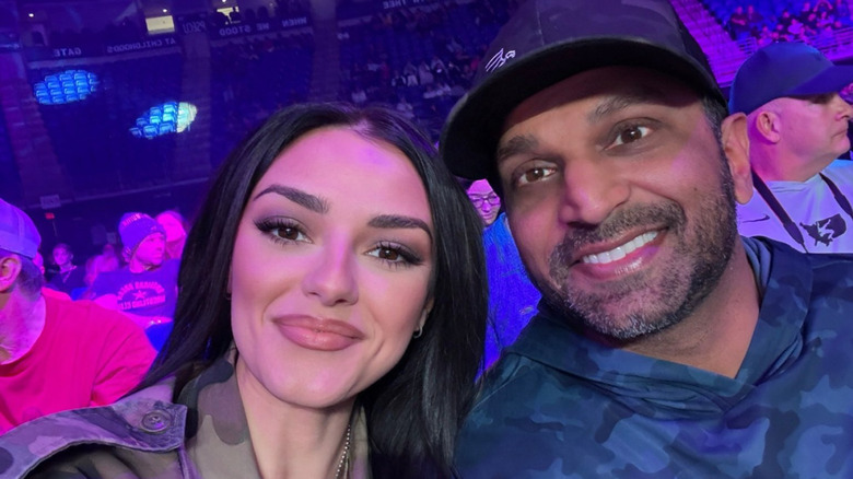 Kash Patel takes selfie with Alexis Wilkins
