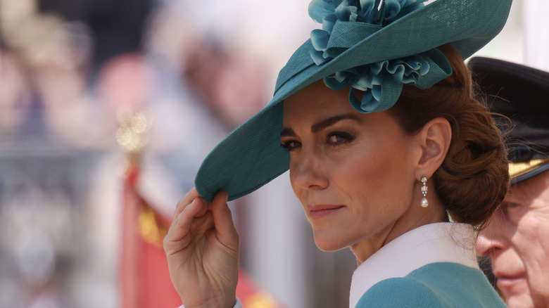 Kate Middleton holding her aqua hat at Trooping the Colour 2025