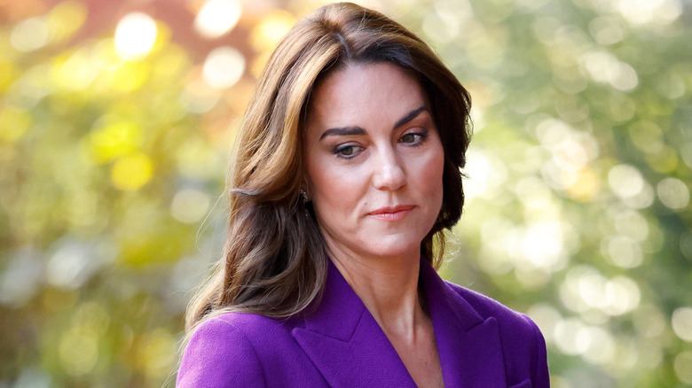 Kate Middleton wearing a purple blazer