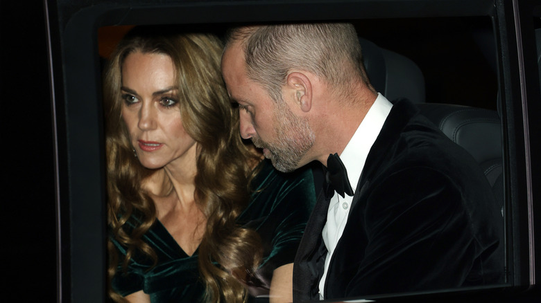 Kate Middleton in a care with Prince William