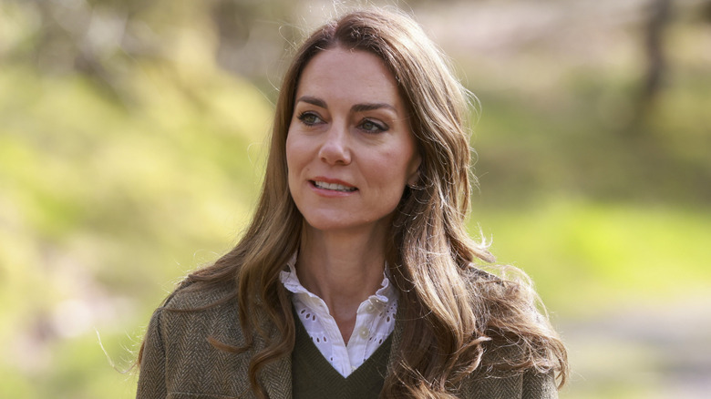 Kate Middleton looks off to the side