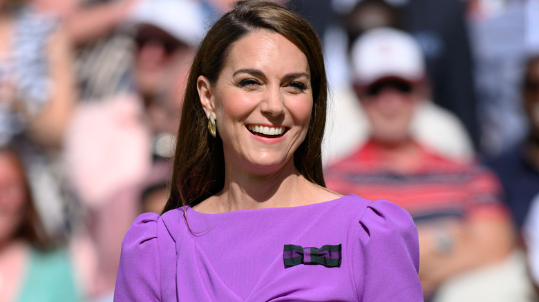 Kate Middleton wearing a purple dress