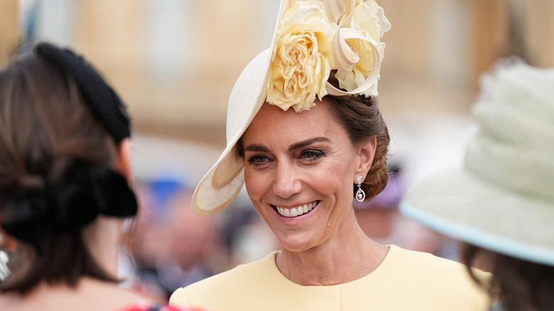 Kate Middleton wearing yellow outfit