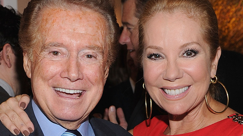 Regis Philbin smiling with Kathie Lee Gifford