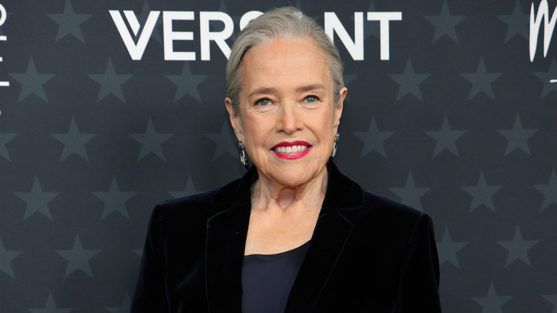 Kathy Bates wearing a black suit