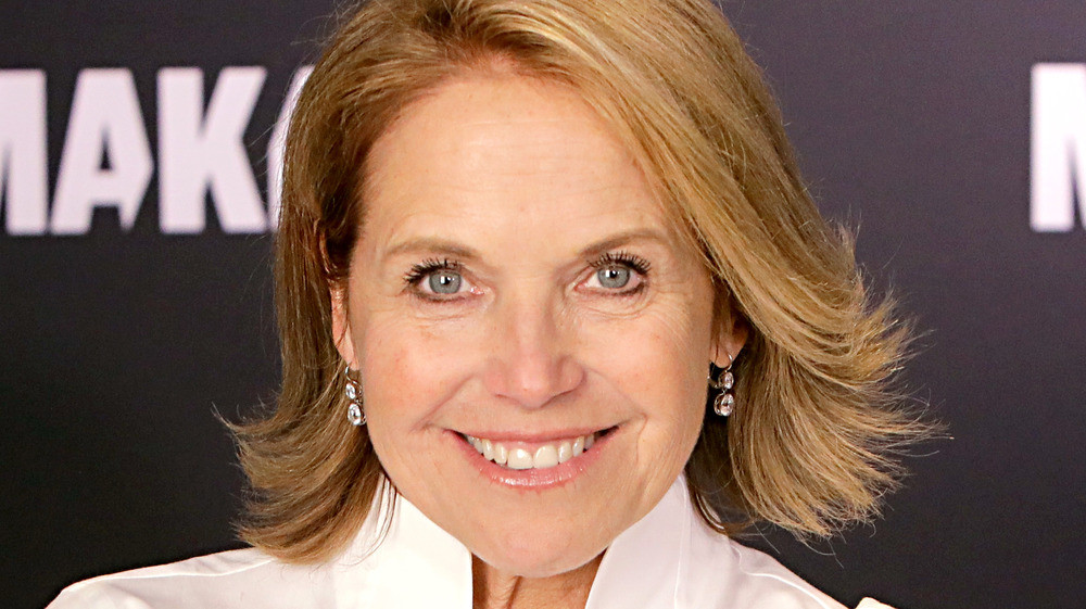 Katie Couric smiling at an event
