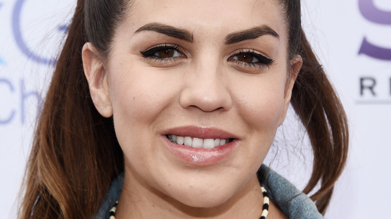 Katie Maloney-Schwartz smiling on red carpet