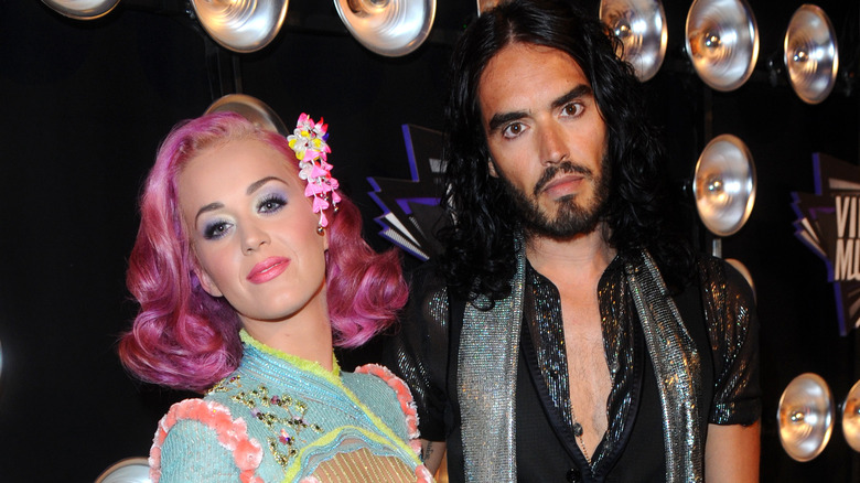 Katy Perry, Russell Brand posing