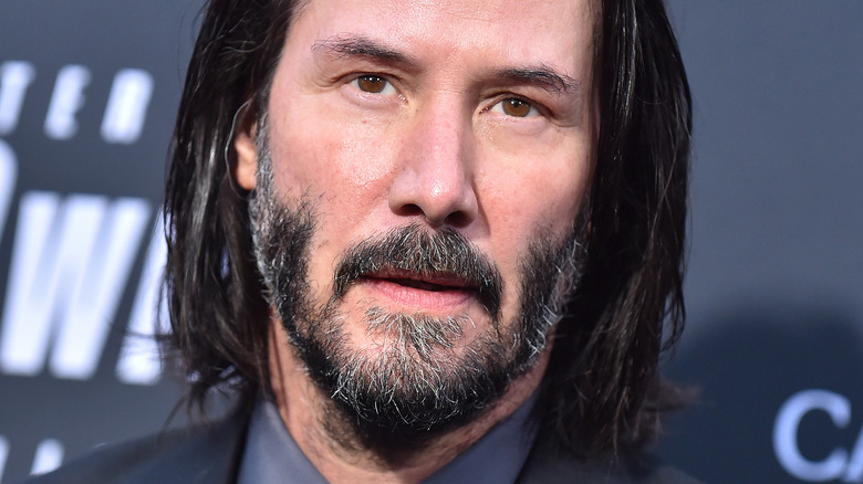 Keanu Reeves with long hair