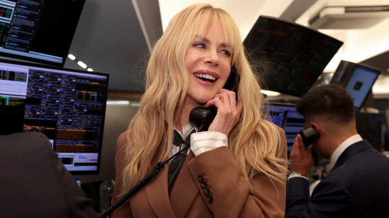 Nicole Kidman speaking on the phone at a charity event in 2026.
