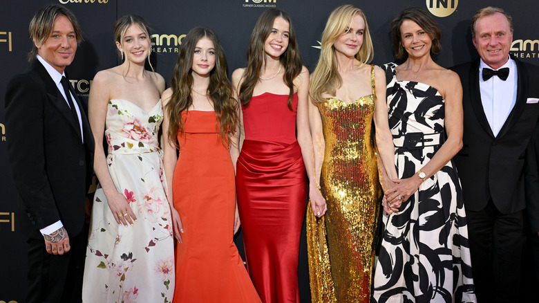 Nicole Kidman posing with family on red carpet