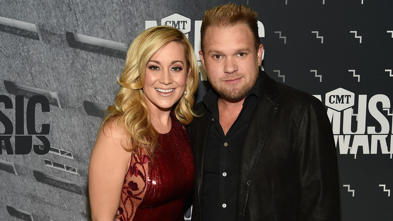 Kylie Jacobs and Kellie Pickler smiling at red carpet event