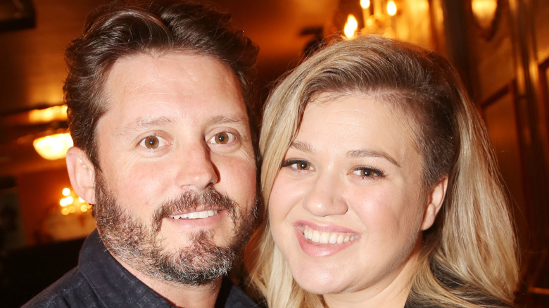 Brandon Blackstock and Kelly Clarkson smiling