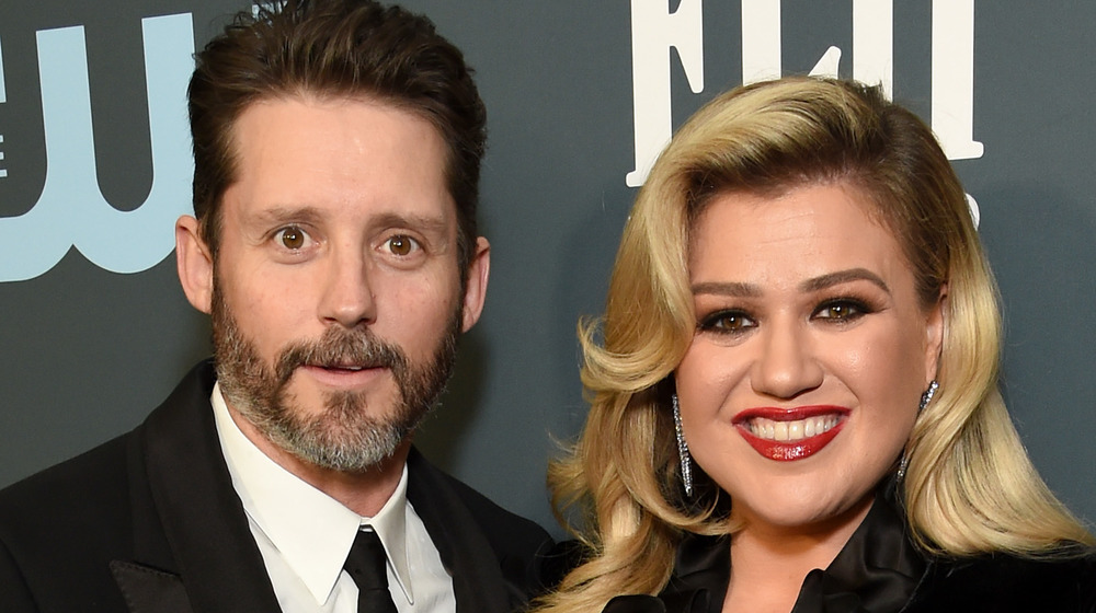 Kelly Clarkson attends an event with Brandon Blackstock