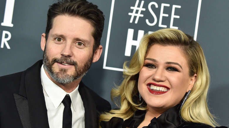 Brandon Blackstock and Kelly Clarkson smiling