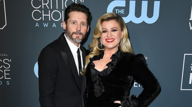 Brandon Blackstock and Kelly Clarkson posing