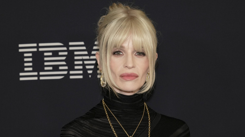 Kelly Osbourne posing