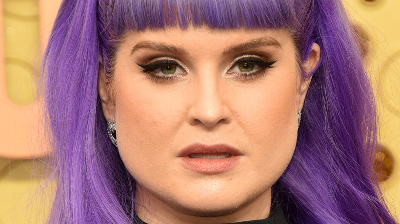 Kelly Osbourne looking into the camera