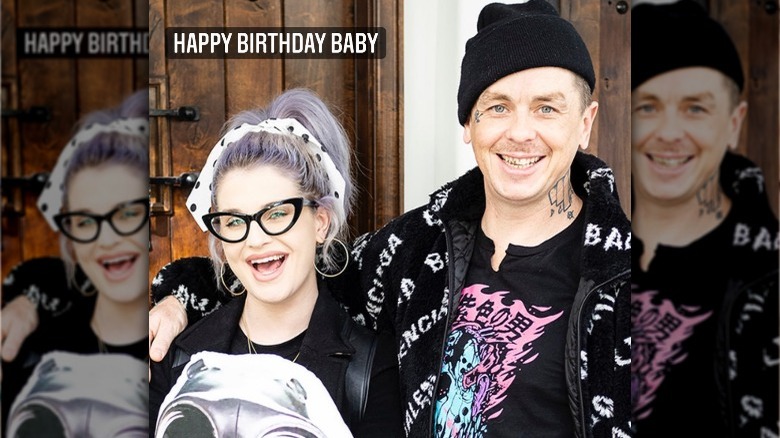 Kelly Osbourne and Sid Wilson posing