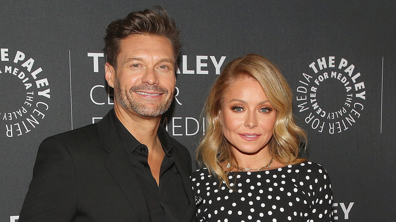 Ryan Seacrest and Kelly Ripa smiling