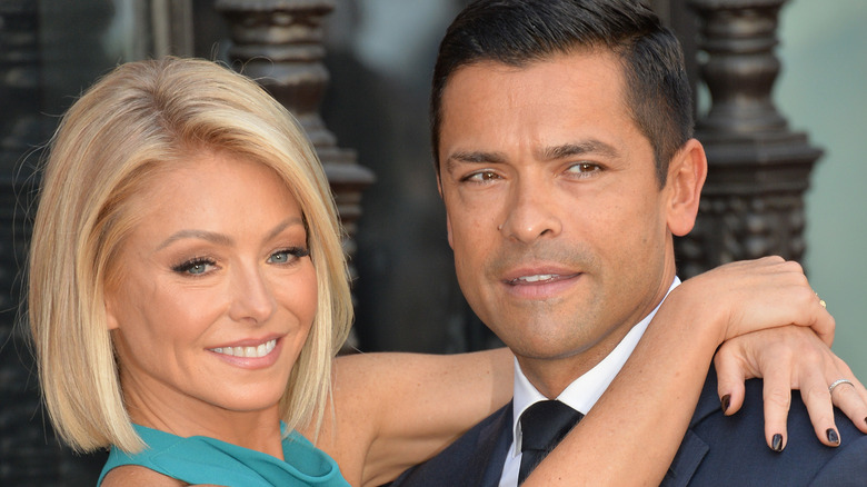 Kelly Ripa embraces Mark Consuelos