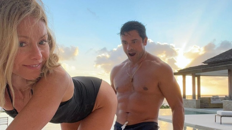 Kelly Ripa and Mark Consuelos in swimwear