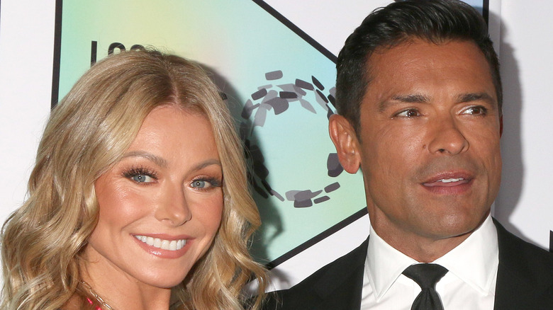Kelly Ripa and Mark Consuelos attending an event