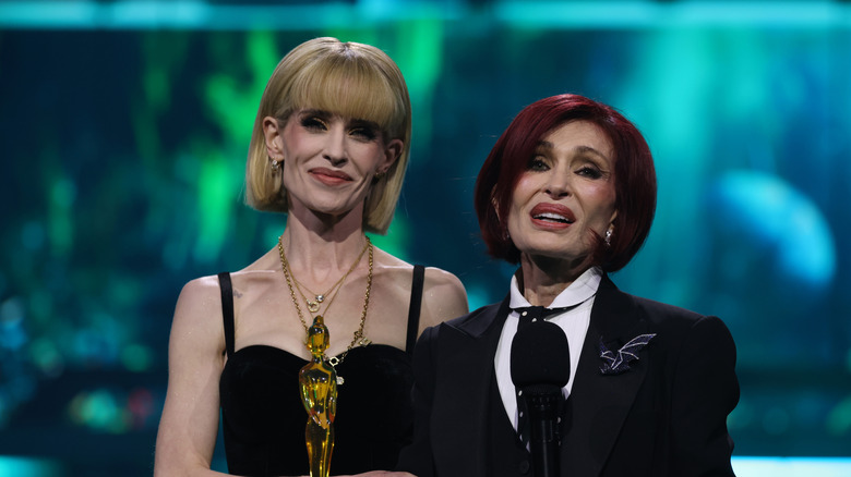 Kelly Osbourne and Sharon Osbourne onstage