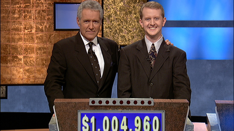 Ken Jennings poses with host Alex Trebek in 2004