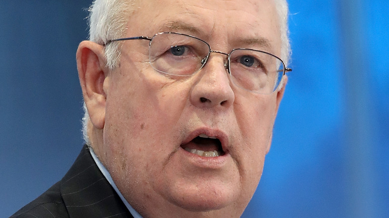 Ken Starr who stars into camera