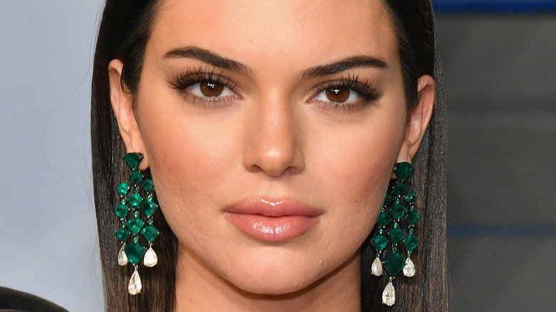 Kendall jenner with big emerald earrings 