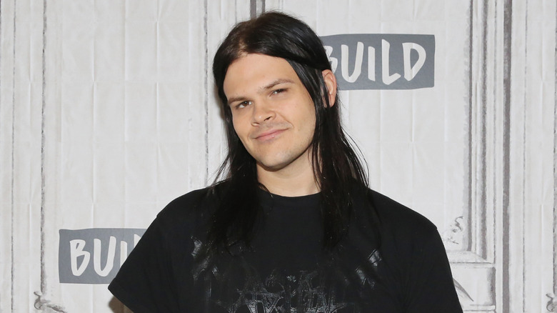 Travis Bacon promoting "Story of a Girl" at Build Studio