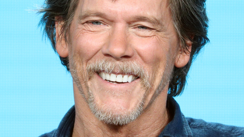 Kevin Bacon laughing