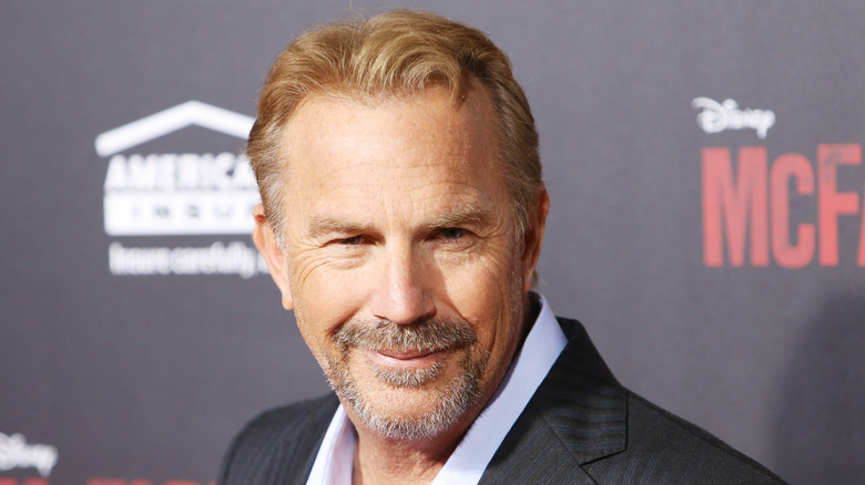 Kevin Costner smirking