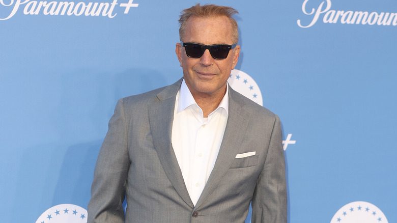 Kevin Costner wearing sunglasses