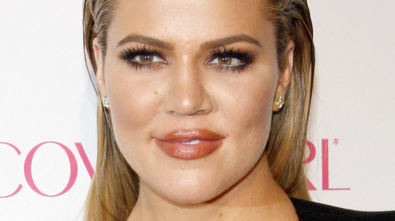 Khloe Kardashian smiles at Cover Girl event