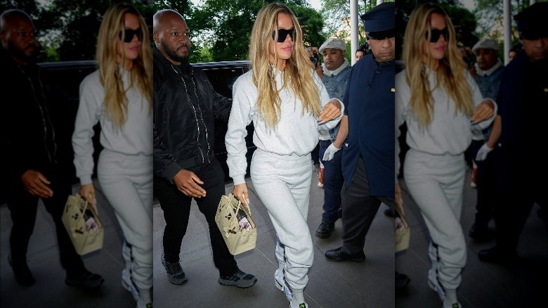 Khloé Kardashian walking in a tracksuit