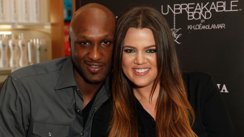 Lamar Odom and Khloé Kardashian posing