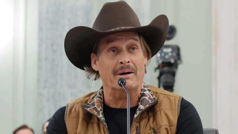 Kid Rock speaking at a Senate subcommittee.