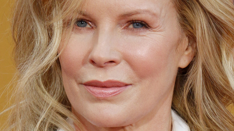 Kim Basinger poses with her hair down