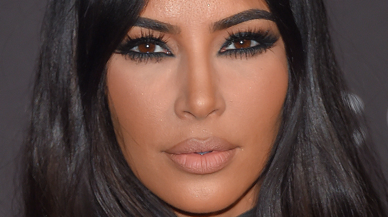 Kim Kardashian with a neutral expression