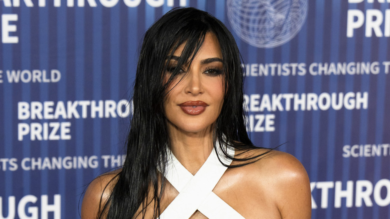 Kim Kardashian wet hair and white dress