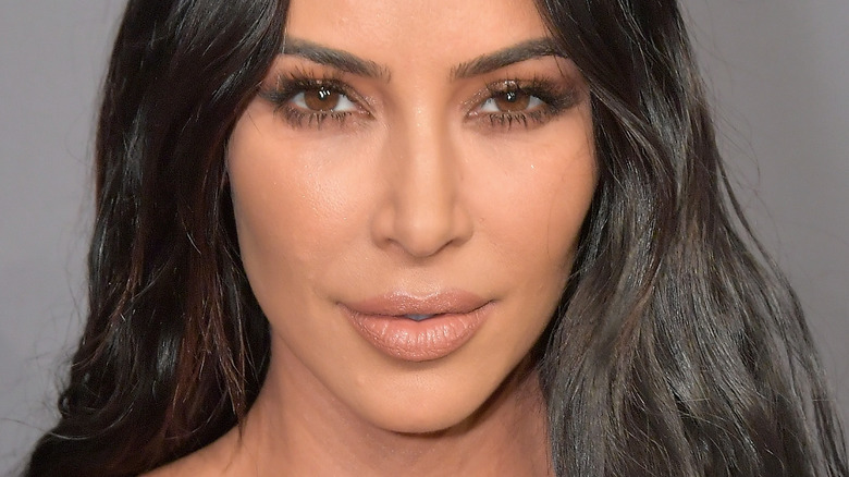 Kim Kardashian parted mouth looking into camera