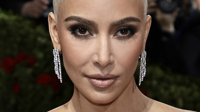 Kim Kardashian with drop earrings