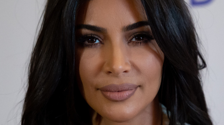 Kim Kardashian gives a smouldering look on the red carpet