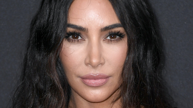 Kim Kardashian looking into the camera